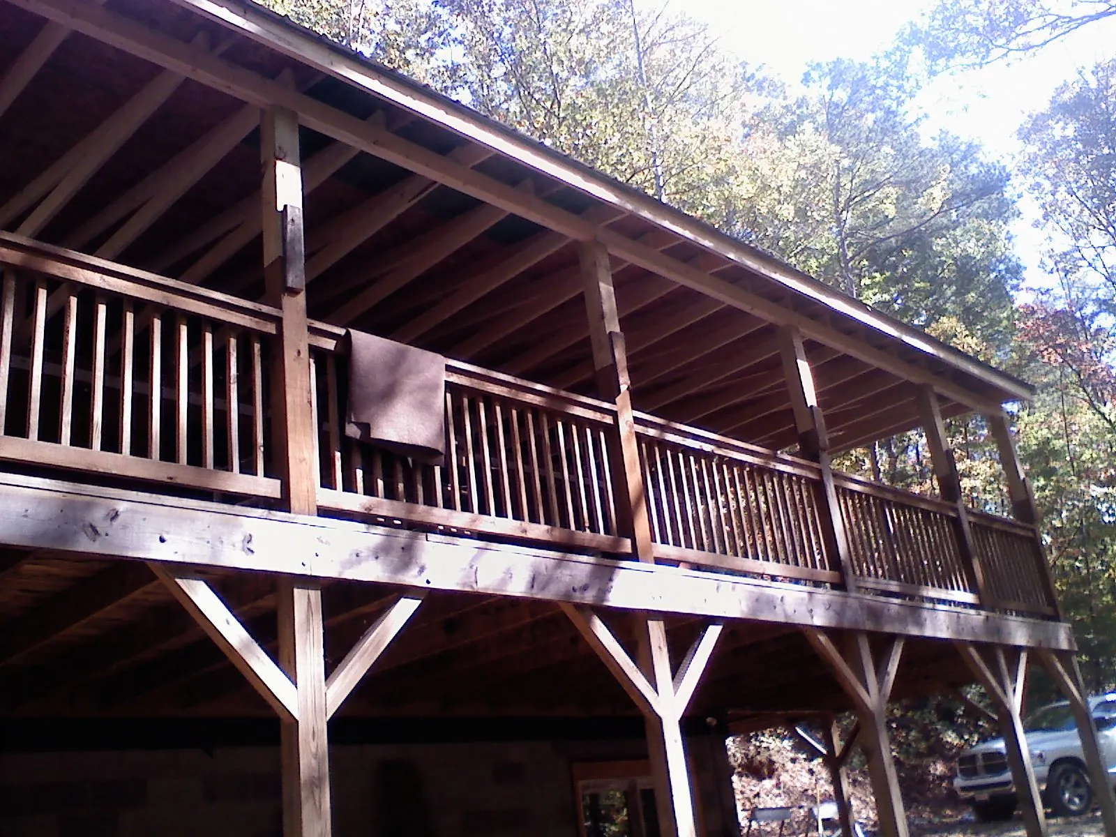 Timber framing under a new elevated porch and deck — Roof Leak Repair in Spencerville by Roofing Brothers